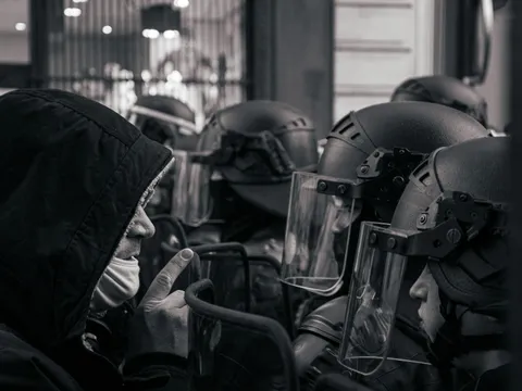Grayscale photo of a motorcycle helmet